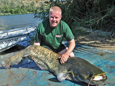 Shane proudly poses with his 82lb 8oz Wels Catfish, which was the group's largest