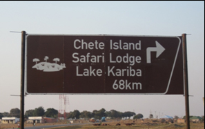 As soon as I saw the sign on the Lusaka Road I knew we would have to change our plans!