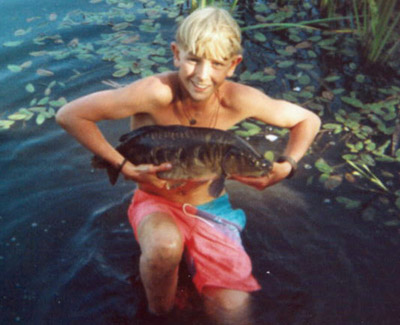 In the water with a carp from the early days!