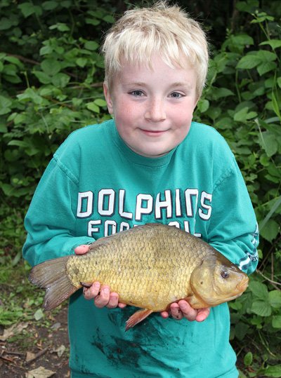 Not a bad second ever crucian, Adam with his 2lb 4oz fish