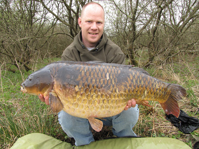 The canals of Scotland are home to some seriously big fish, such as this 34lb  carp – the current Scottish record – that was netted by Davy McLeish on the Forth & Clyde Canal.
