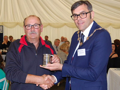 Tim Fagg receives his award