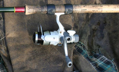 Fit the reel to the rod about 4ins below the top of the butt