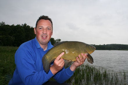 Mike Townsend and a Sywell tench