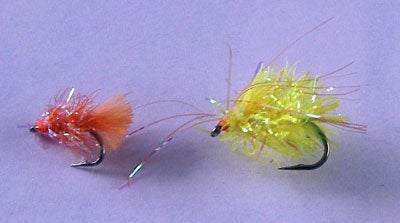 Blobs.  My version is on the left, a shop bought version on the right.  Note that mine is tied slimmer and has a short marabou tail.  Mine is tied on a size 14 wet fly hook.  Those of you going to Press Manor might care to note that I did very well there on this fly when I last attended an FM fish-in