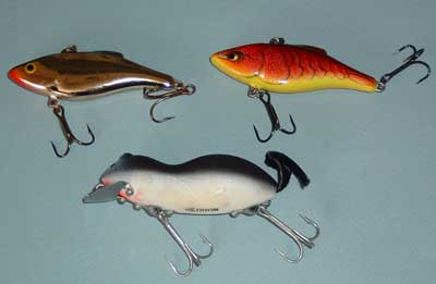 Top, two Rapala Rattlin Raps and below a Heddon Mouse