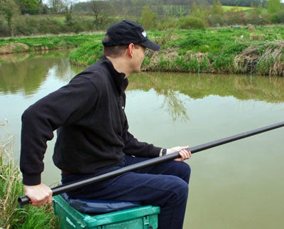 Mark fishing the long pole at full length and demonstrating an alternative method of holding it