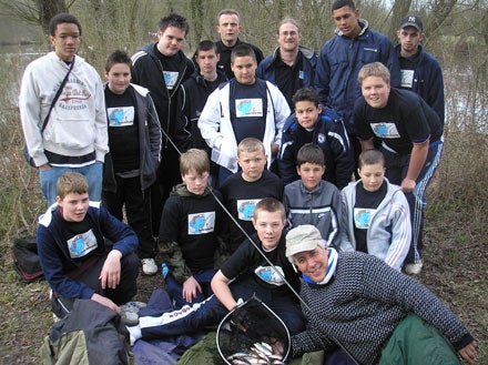 Reading MP and spokesman for angling Martin Salter with the group of youngsters keen to learn about angling